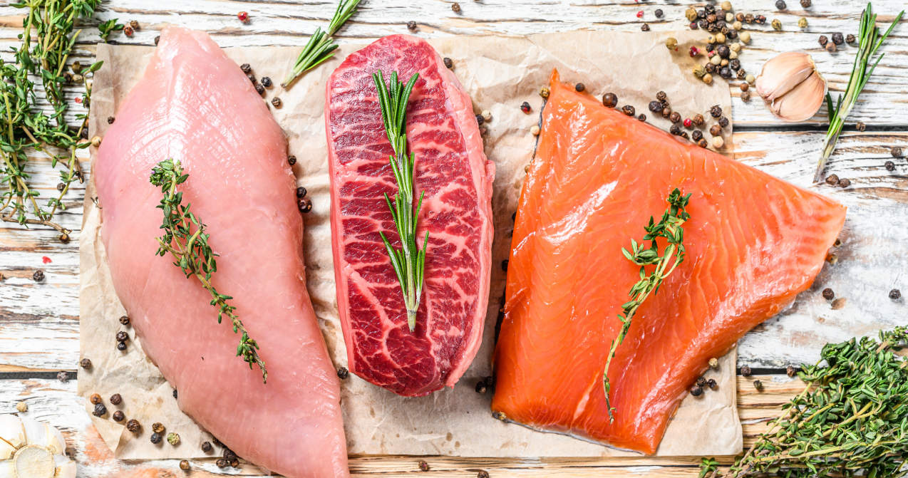 Three pieces of raw, uncooked seafood